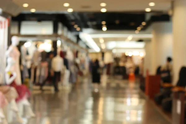Blurred picture of Clothing store fashion shop inside shopping mall, Department store background, Clothing store fashion blur inside mall