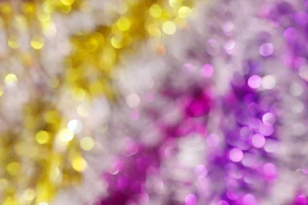 blurred picture yellow gold and purple bokeh colorful glittering for merry christmas and happy new year festival background design