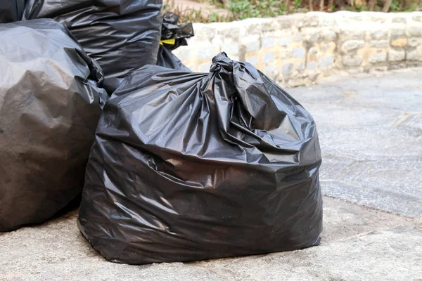 Waste Pile Garbage Black Bags Plastic Stack Floor Ground — Stock Photo, Image