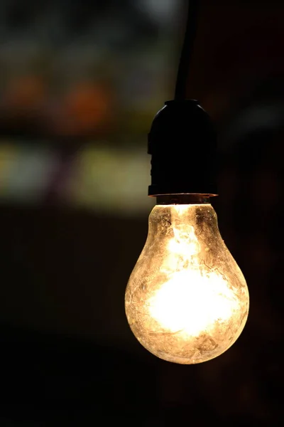 Light bulb, Old light bulb Sphere on a black  background night time