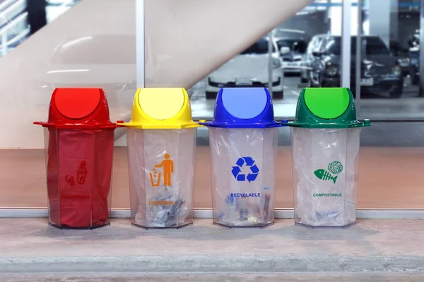 Bin, Recycle bin, Plastic waste bin, Trash Red Yellow Blue and green 4 types of waste for recycle at park