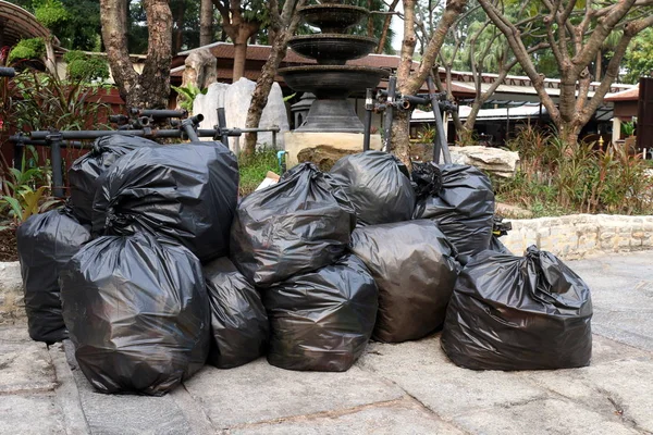 Waste Lots Pile Garbage Black Bags Plastic Stack Floor Ground — Stock Photo, Image