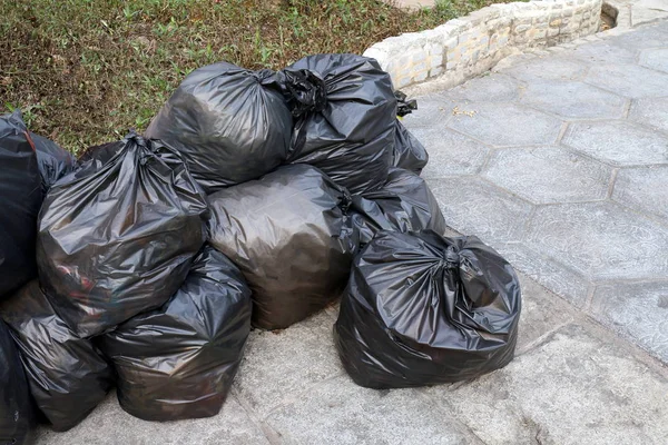 Waste Lots Pile Garbage Black Bags Plastic Stack Floor Ground — Stock Photo, Image