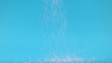 Şeker, yığın üzerine dökülen beyaz granüllü şeker aşırı şeker tüketimini, şeker hastalığını ve sağlık risklerini, sağlık farkındalığını, şekerli gıdalar için granüllü şekeri ve tatlı malzemesini sembolize eder.