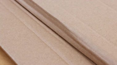 kıvrımlı karton doku, ambalaj endüstrisi için kahverengi karton kağıt, geri dönüşüm, lojistik, ihracat ithalat ve depo kullanımı, arka plan için kıvrımlı mukavva, kağıt atığı geri dönüşümü kavramı