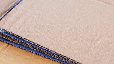 kıvrımlı karton doku, ambalaj endüstrisi için kahverengi karton kağıt, geri dönüşüm, lojistik, ihracat ithalat ve depo kullanımı, arka plan için kıvrımlı mukavva, kağıt atığı geri dönüşümü kavramı