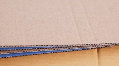 kıvrımlı karton doku, ambalaj endüstrisi için kahverengi karton kağıt, geri dönüşüm, lojistik, ihracat ithalat ve depo kullanımı, arka plan için kıvrımlı mukavva, kağıt atığı geri dönüşümü kavramı