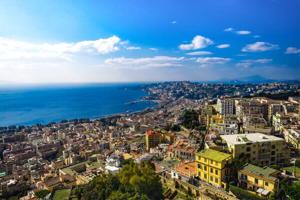 Travelling to Italy. Amazing sunny day view of Posillipo Hill, Naples. Panoramic view.