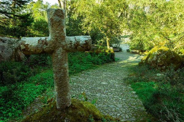 Road to ancient stone cross, Convent of the Capuchos