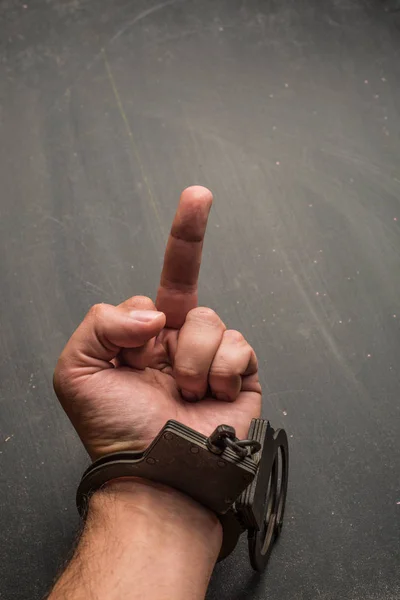 Handcuffs Hand Close Middle Finger Dark Background — Stock Photo, Image