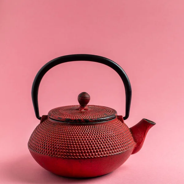 Red cast iron tea pot. — Stock Photo, Image