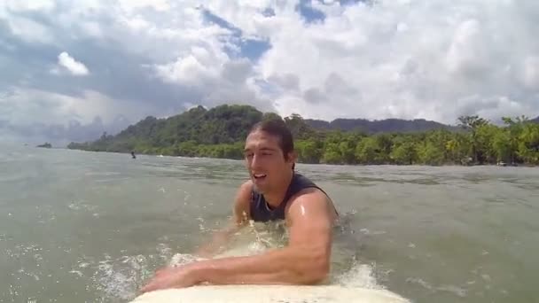 Handsome Surfer Smiling Enjoying Challenge While Hanging Surfboard — Stock Video