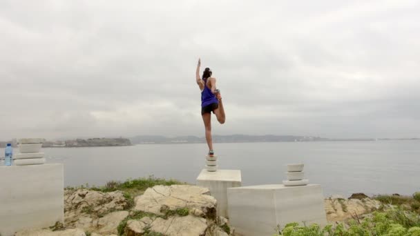 Still Shot Woman Balancing Top Stack Rocks Facing Ocean Gijon — Stock Video