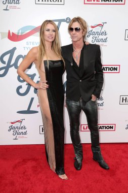 Los Angeles - Şubat 10: Susan Holmes-Mckagan, Los Angeles, Ca üzerinde 10 Şubat 2019 Raleigh stüdyolarında da 2019 Steven Tyler'ın Grammy görüntüleme partisinde Duff Mckagan