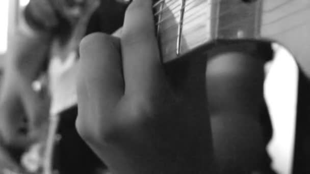 Young Boy Playing Guitar Close — Stock Video