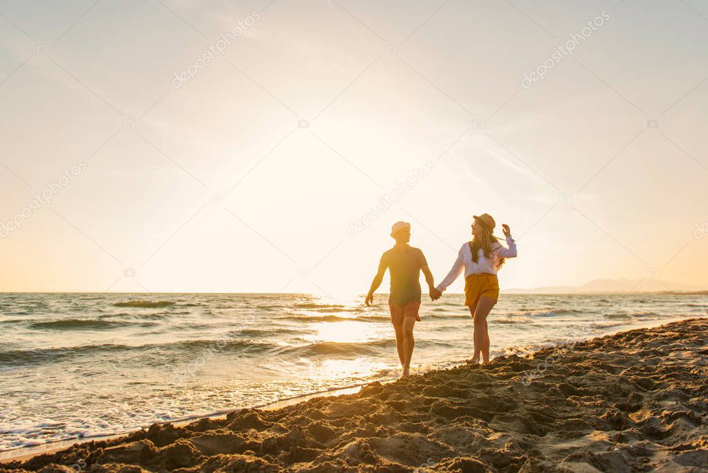 Happy Romantic Middle Aged Couple Enjoying Beautiful Sunset Walk
