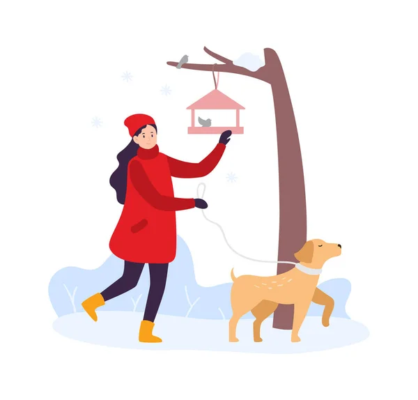 Attività invernali. Ragazza che cammina con cane e nutre uccelli. Donna personaggio in abbigliamento invernale con animale domestico — Vettoriale Stock