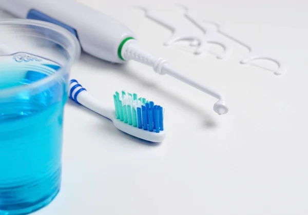 Dental Oral Irrigator Toothbrush Dental Floss Mouthwash White Background Close — Stock Photo, Image