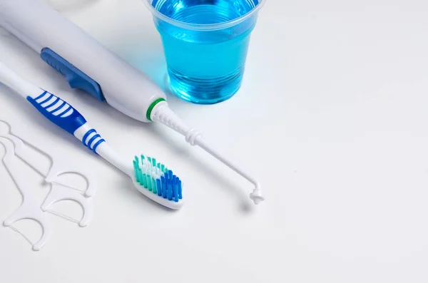 Dental Oral Irrigator Toothbrush Dental Floss Mouthwash White Background Close — Stock Photo, Image