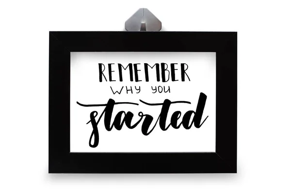Remember why you started. Handwritten text. Modern calligraphy. Inspirational quote. Black photo frame. Isolated on white