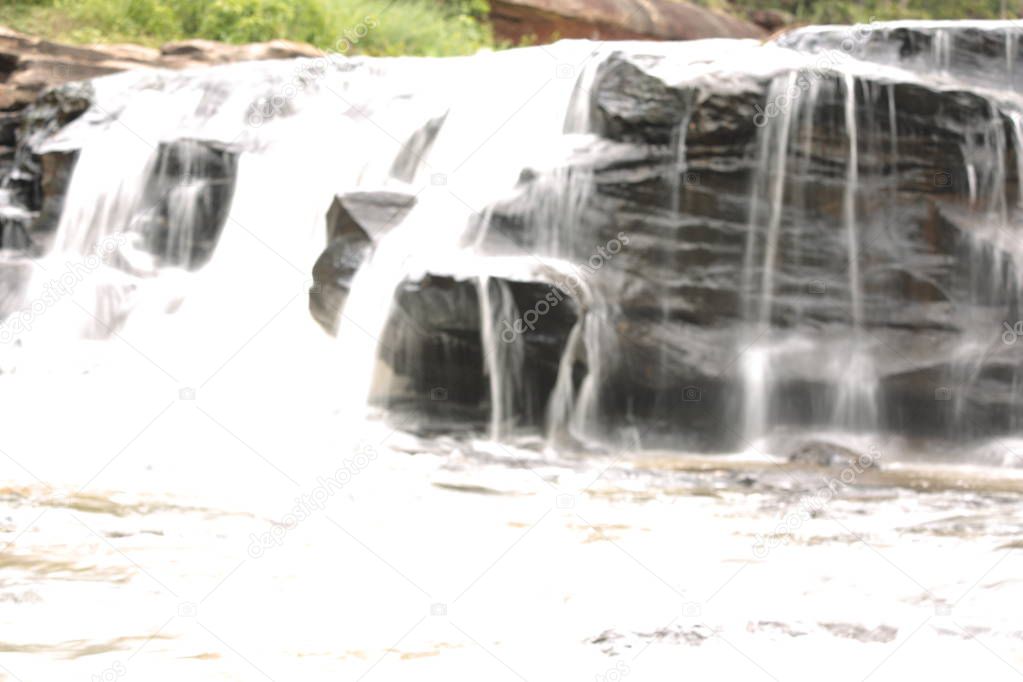 Take pictures of waterfalls at low speed.  Waterfall in northeast of Thailand : samrong kiat waterfall in Khun han, sisaket ,Thailand.