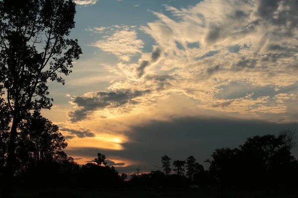 Sunrise sky blue and orange forming a border.