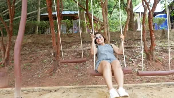 Middle Aged Asian Woman Sitting Swing Happy Swing She Returns — Stock Video