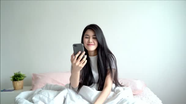 Beautiful Asian Woman Sitting Bed Using Mobile Phone Talk Social — Stock Video