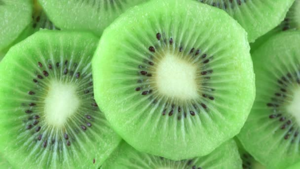 Makrorotation Videoaufnahmen Von Scheiben Kiwi Frucht Close Fruchtfleisch Von Kiwi — Stockvideo