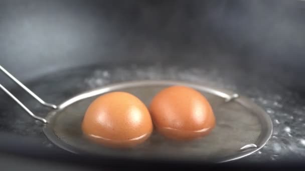 Slow Motion Shot Taking Boiled Eggs Out Boiled Water Gros — Video