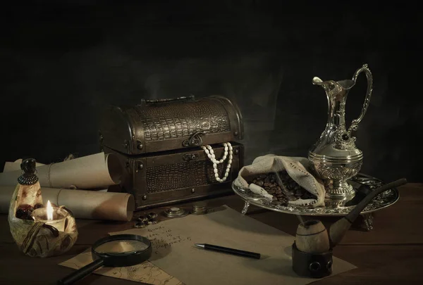 pirates mining on wooden background, stolen treasures still life on table in filibuster room, luxury ancient jewelry, piracy concept, old treasure chest with pearl necklace