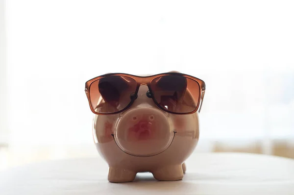 Piggy bank wearing retro sunglasses cutout