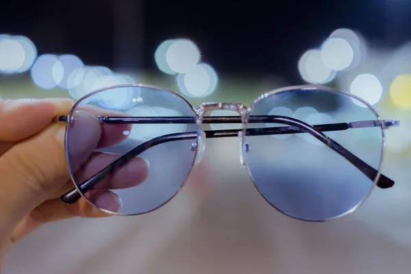 Black Glasses Have Male Hand Vintage Bokeh Background — Stock Photo, Image