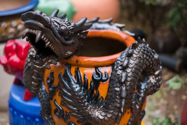 Pottery ceramic dragon. This is a work of art in clay sculpture. Traditional and ancient.