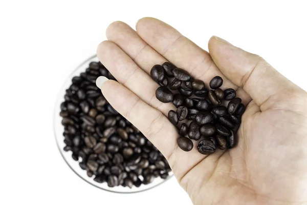 Männerhand Greift Nach Kaffeebohnen Und Darunter Eine Schüssel Voller Kaffeebohnen — Stockfoto