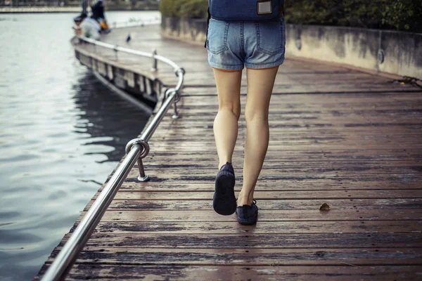 Close Foot Girl Walking Street Wood Bridge Riverside Public Park — Stock Photo, Image