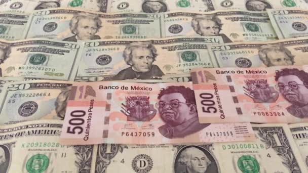 Billetes Mexicanos Cayendo Sobre Dólares Estadounidenses — Vídeos de Stock