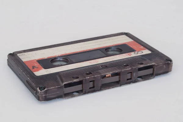 Schwarzes Audiokassettenband Auf Weißem Hintergrund — Stockfoto