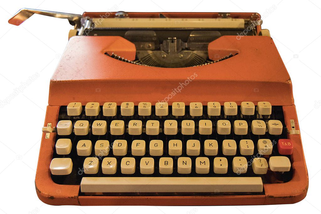 Old vintage Retro orange typewriter on table