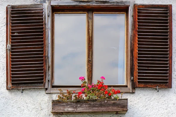 Beautiful window with flower box on top, Switzerland