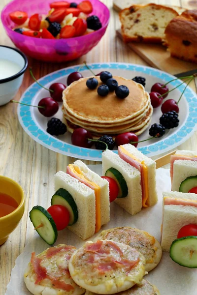 healthy breakfast with pancake and sandwich club
