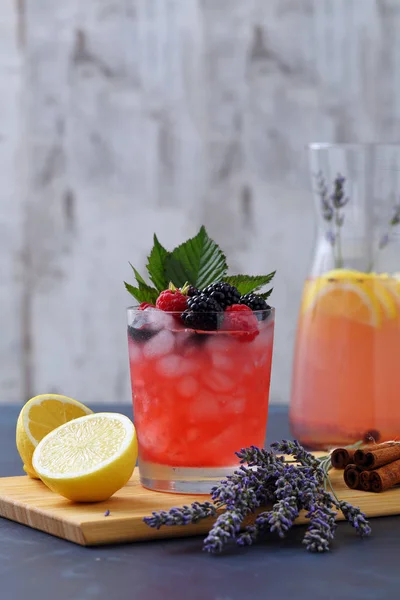 Chilled soft drinks with ice  and berries