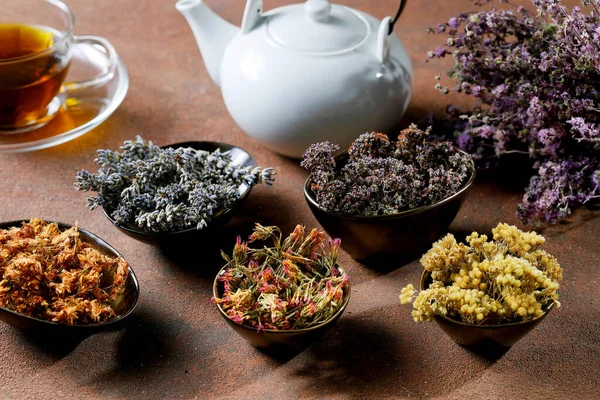 herbal tea and dried flowers background