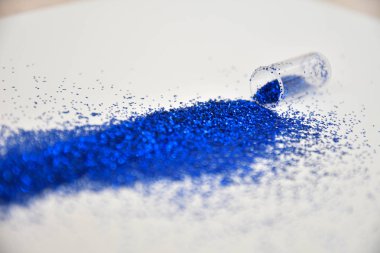 Arka plan mavi payet. Kumaş pullu parlak renkler. Moda kumaş glitter, pullu