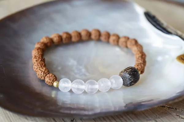 stock image Natural mineral stone bracelet on wooden background