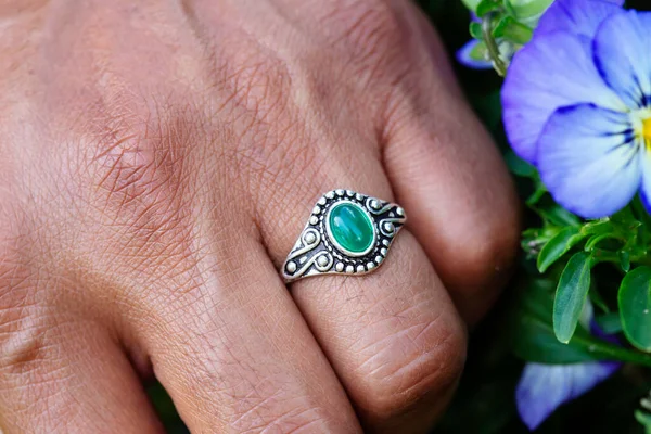 Hand Wearing Metal Decorative Ornamental Ring Jade Gemstone Touching Plants — Stock Photo, Image