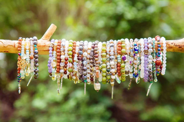 Collection Crystals Mineral Stone Beads Yoga Bracelets Hanging Branch Natural — Stock Photo, Image