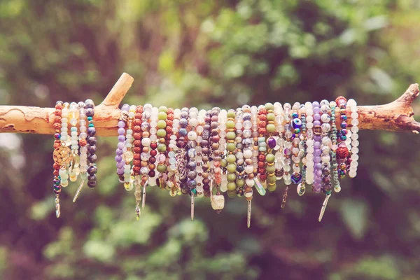 Collection Crystals Mineral Stone Beads Yoga Bracelets Hanging Branch Natural — Stock Photo, Image