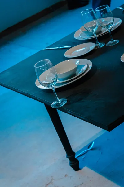 Dishes at the edge of a table