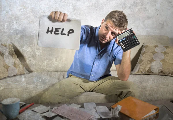 Young Stressed Overwhelmed Man Biting Calculator Holding Mess Bank Receipts — Stock Photo, Image